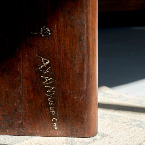 Lemieux et Cie Pierre Jeanneret library table in solid teak - close-up of the tapered panel-leg base with an original hand-scratched inscription
