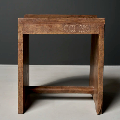 Lemieux et Cie Pierre Jeanneret stool in solid teak with the CCI/203 institutional stencil, c. 1960, Capitol Complex, Chandigarh - front view with the CCI/203 stencil on the apron, flat slab legs and a concave saddle seat