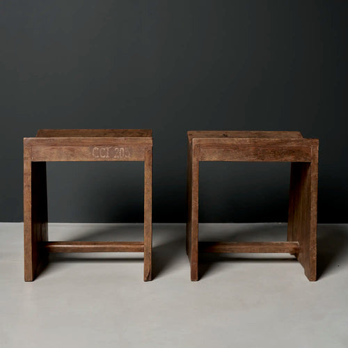 Lemieux et Cie Pierre Jeanneret stool in solid teak with the CCI/203 institutional stencil, c. 1960, Capitol Complex, Chandigarh - two stools shown together, the front apron bearing the CCI/203 stencil, with flat slab legs and a concave saddle seat