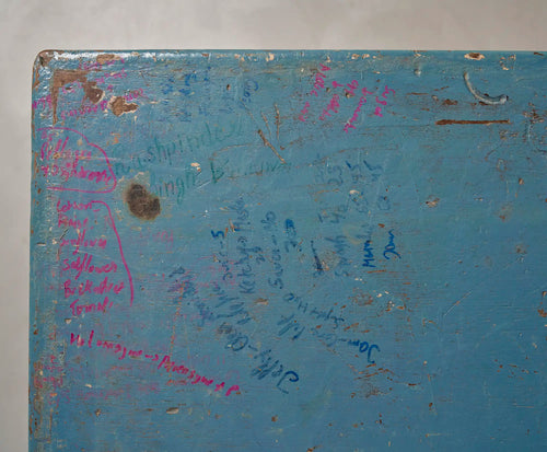 Lemieux et Cie Pierre Jeanneret X-leg student desk with original blue painted top - overhead view of the blue painted top covered in handwritten notes, names and equations