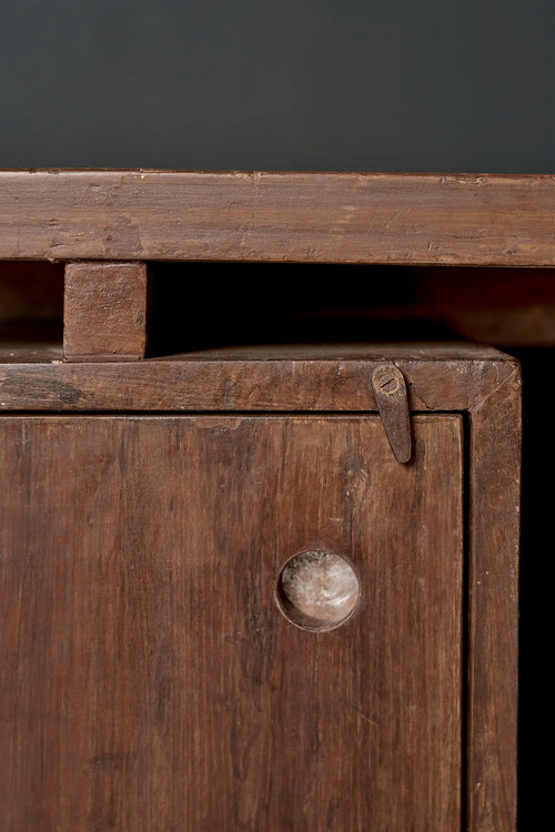 Lemieux et Cie Pierre Jeanneret writing desk in solid teak - close-up of the single-door storage compartment with its circular cutout pull