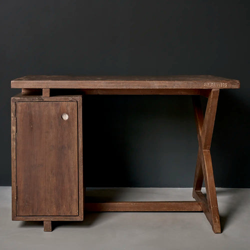 Lemieux et Cie Pierre Jeanneret writing desk in solid teak - front view of the dual-sided pedestal showing the single-door storage compartment, with the X-leg frame