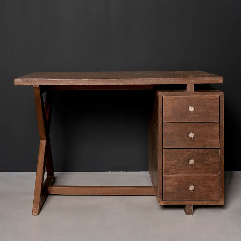 Lemieux et Cie Pierre Jeanneret writing desk in solid teak, c. 1960, Physics Department, Panjab University, Chandigarh - front view showing the floating top, the X-leg frame with floor stretcher and the integrated four-drawer pedestal