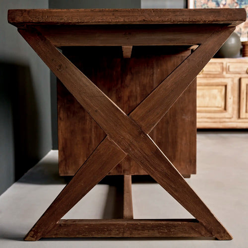 Lemieux et Cie Pierre Jeanneret writing desk in solid teak - end view of the solid teak X-leg frame with floor stretcher