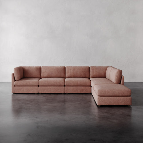 Lemieux Et Cie Chanaux 6-Pc Sectional
Brown sectional sofa on a gray floor with a plain white wall background