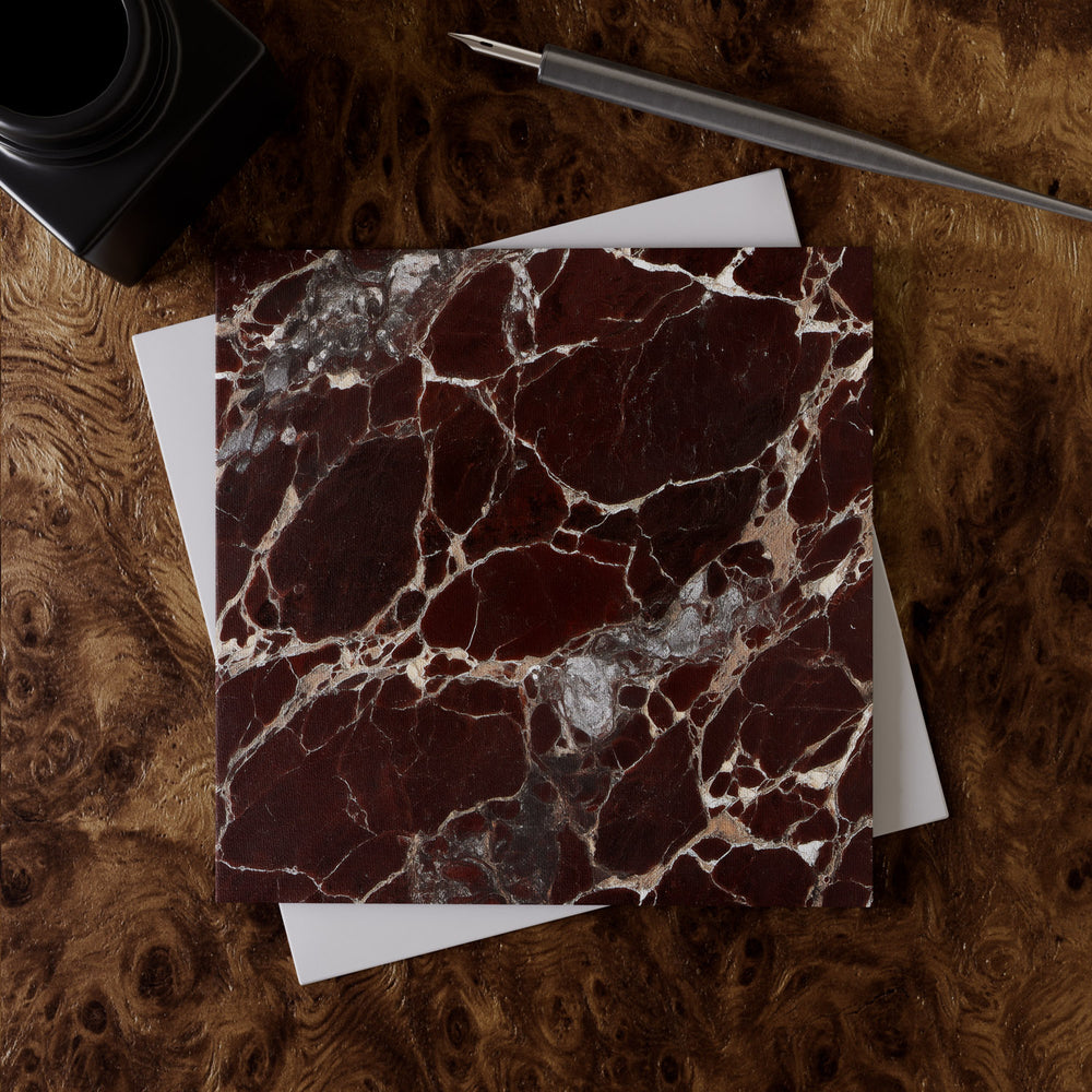 Lemieux et Cie Rosso Levanto Greeting Card Set in deep burgundy marble with ivory veining, stationery shown on figured wood surface with envelope and pen