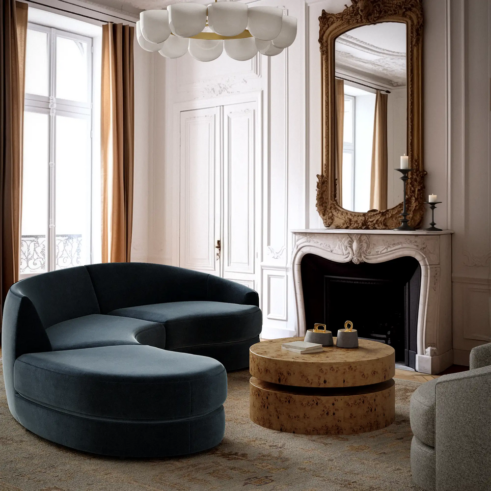 Lemieux et Cie Rulmann 3-Piece Right Sectional in deep teal, curved sofa with rounded ottoman, shown in Parisian sitting room with fireplace and tall windows.