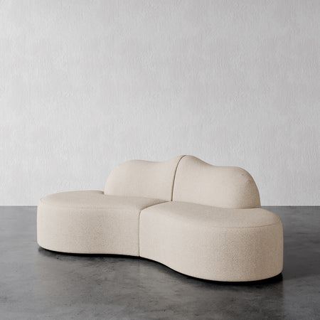 Lemieux Et Cie Serpentine 2-Piece
Beige modern sofa on a gray floor with a white wall background