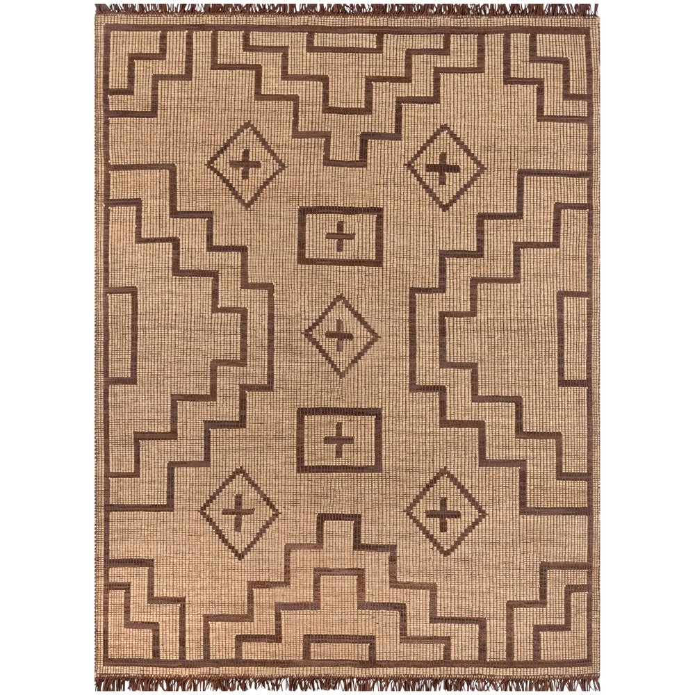 Lemieux et Cie Tugart Rug in natural jute and brown leather, handwoven area rug with geometric pattern and leather fringe, shown on white studio backdrop.