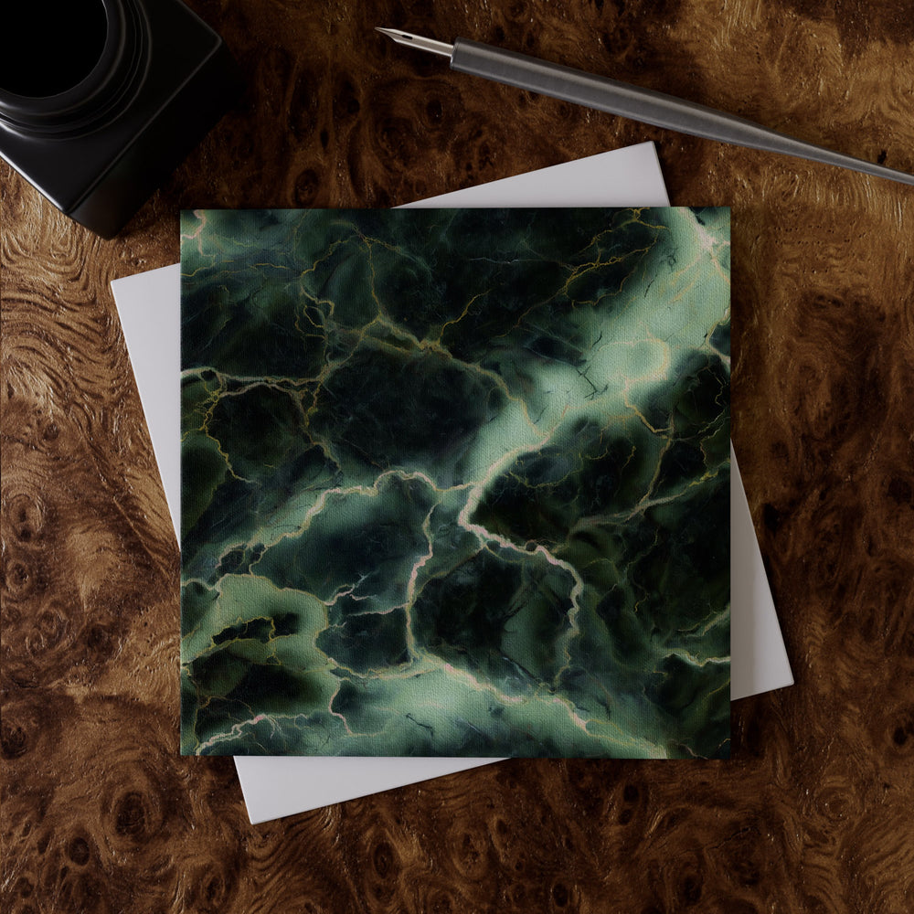 Lemieux et Cie Verde Alpi Greeting Card Set in jade and smoke tones, luxury card on linen paper, styled on figured wood surface with pen and envelope.
