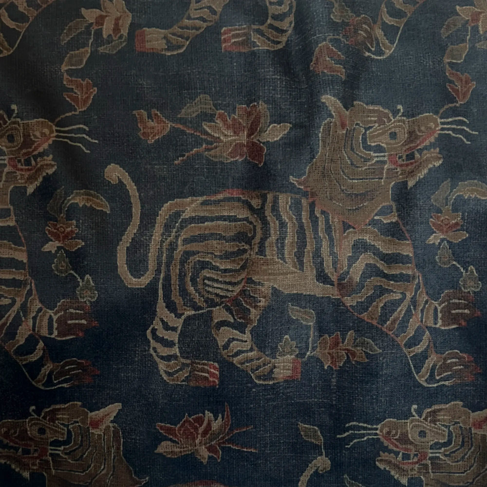 Lemieux et Cie Tiger Velvet Pillow in Indigo, close-up of woven tiger and floral motif in deep indigo performance velvet with warm taupe and terracotta accents.