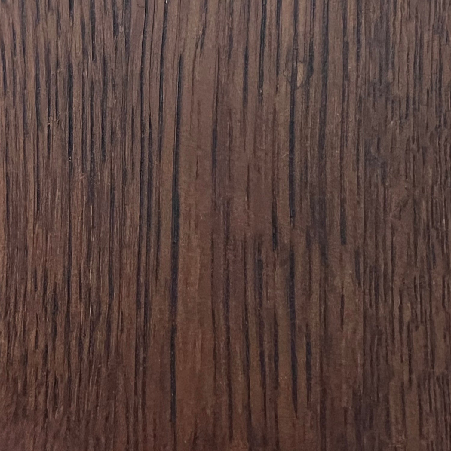Lemieux et Cie Oak Wood Leg Finishes swatch in warm brown with linear grain, wood finish sample shown in close detail.