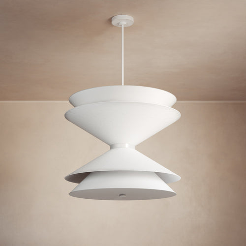 Lemieux et Cie Balleroy Pendant in white matte finish, sculptural tiered form with curved discs, hung in a room with warm neutral walls and ceiling.