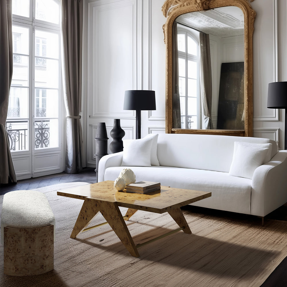 Lemieux et Cie Marchand Nightstand, scalloped-edge bedside table with textural door fronts, styled in a Parisian sitting room with white paneled walls and wood flooring.