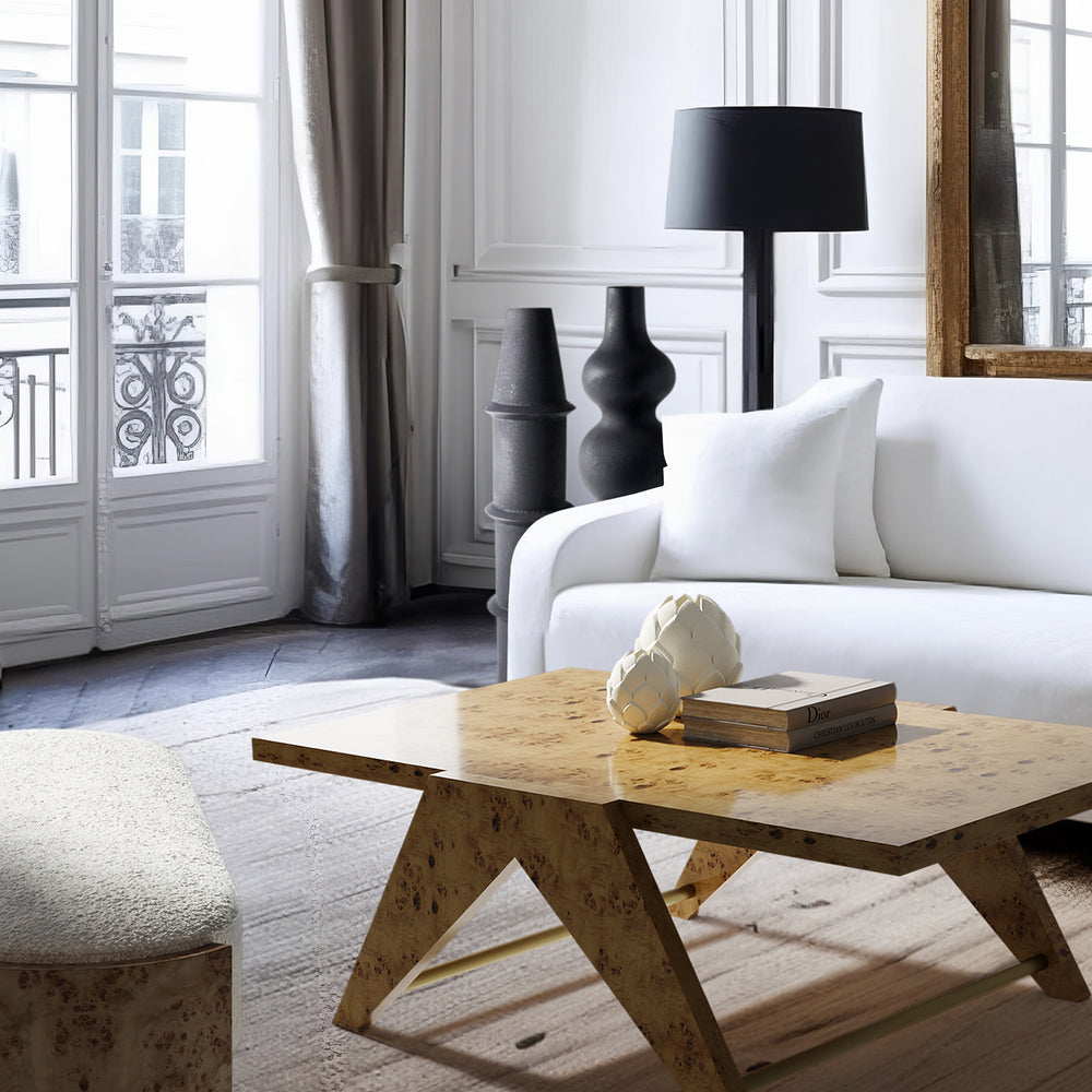 Lemieux et Cie Modernist Ceramic Vase in artichoke-inspired form, handmade sculptural piece styled on coffee table in Parisian sitting room with white paneled walls.