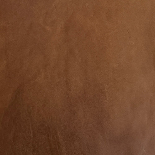 Lemieux et Cie Aniline Leather Swatch in warm cognac tone with natural grain, material sample shown in soft studio light.