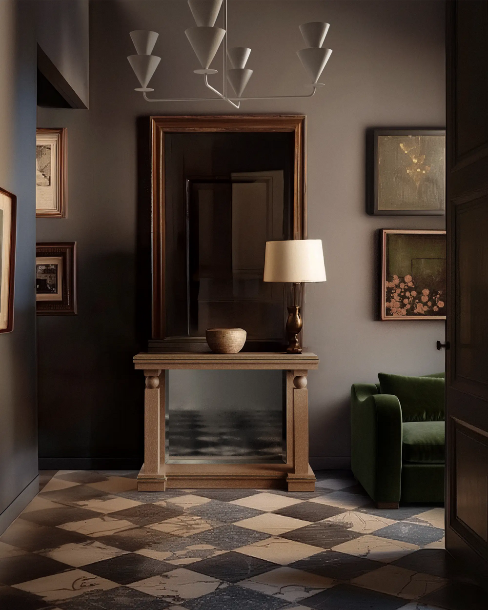 Lemieux et Cie Corvaux Console Table, columnar pedestal legs with turned detailing, styled in a sitting room with warm gray walls and patterned stone floor.
