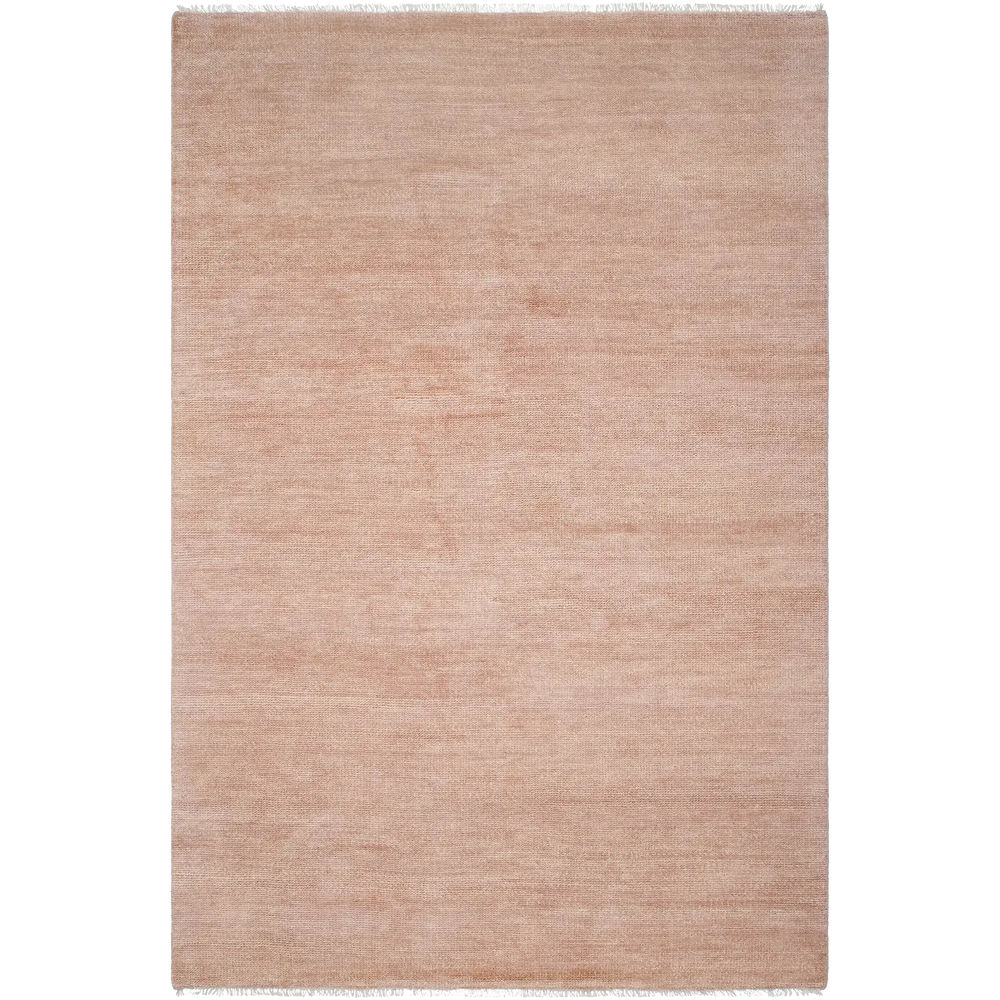 Lemieux et Cie Rochefort Handmade Wool Rug in blush, hand-knotted rug with fringe detail, shown on white studio backdrop.