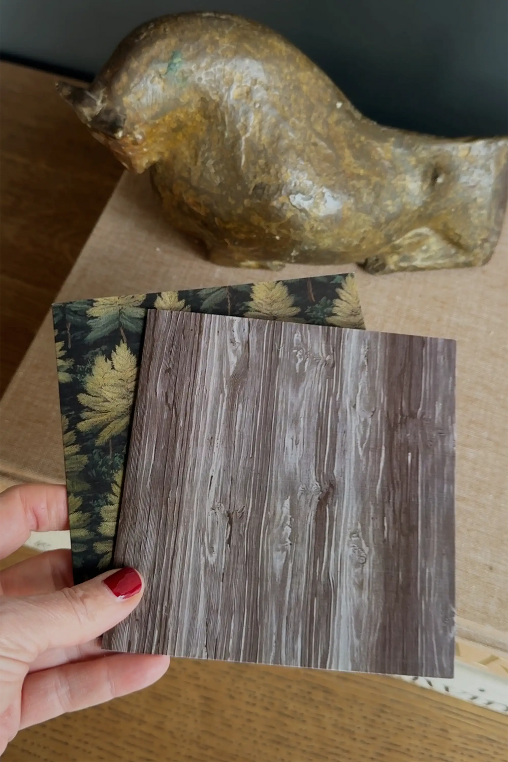 Lemieux et Cie Forest Evergreen Gift Greeting Card Set, nature-inspired stationery swatches held near an organic sculptural vessel on wood surface