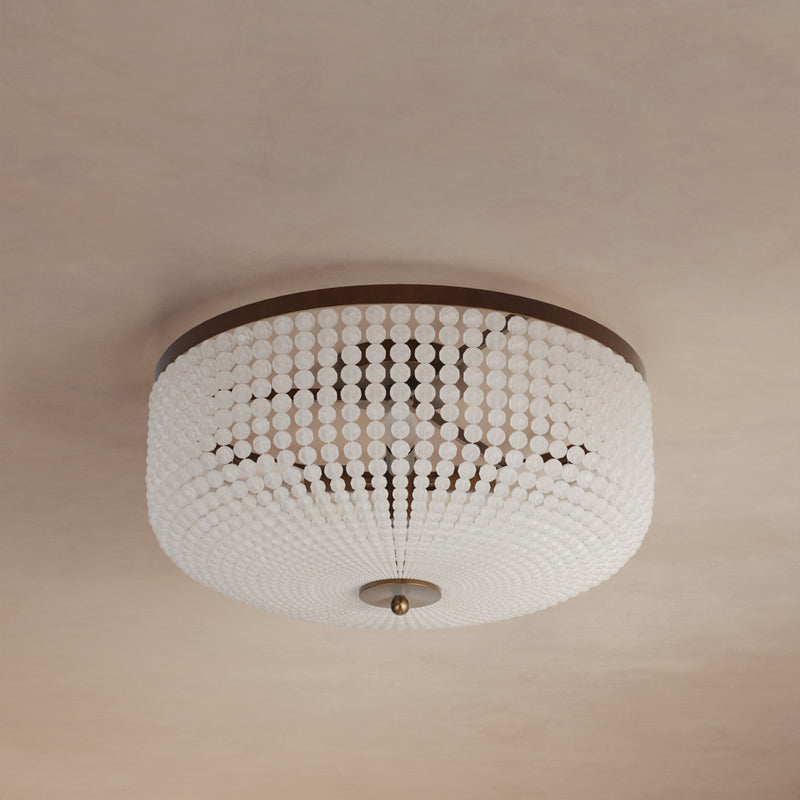 Lemieux et Cie Bellecour Flush Mount with hand-strung crystal beads in vintage gilded brass, ceiling-mounted fixture shown on neutral ceiling in soft light.