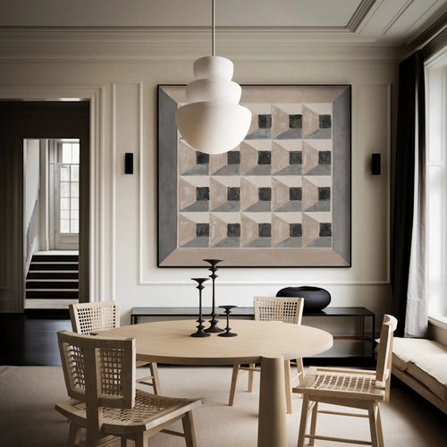 Lemieux et Cie vintage Paris map in black, white and primary colors, newly gallery-framed artwork, hung in dining room with neutral paneled walls and wood flooring.