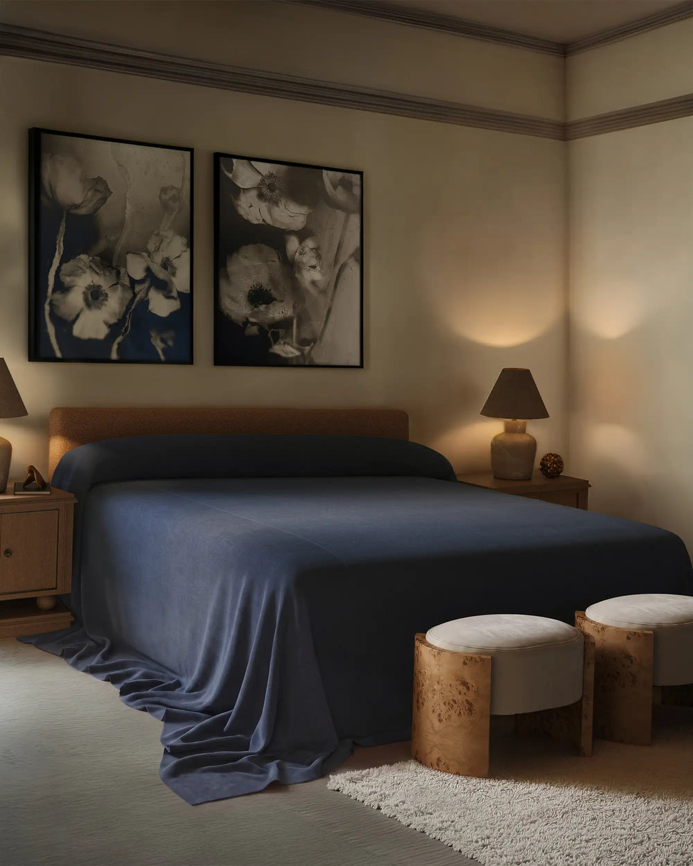 Bedroom with the Herbier Un and Deux limited edition prints hung over a bed with the heavy linen coverlet indigo