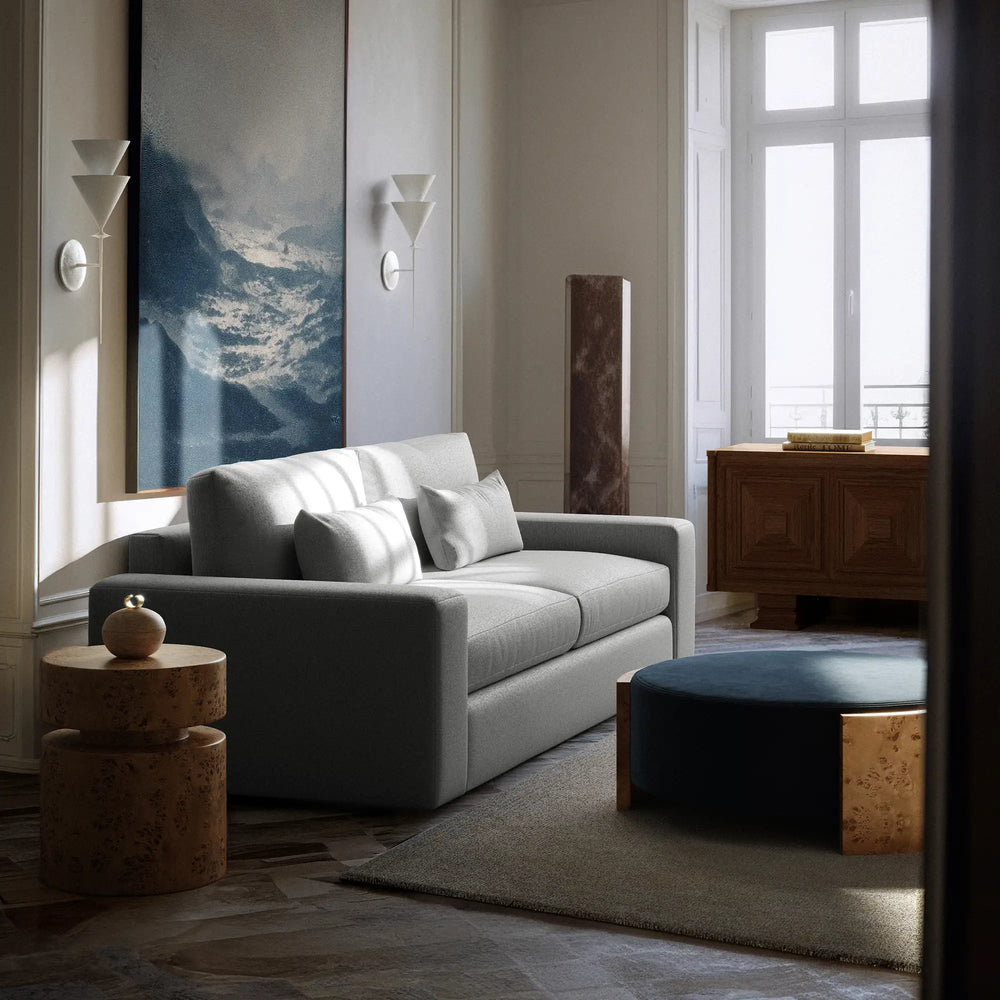 Lemieux et Cie Deauville Limited Edition Art Print, abstract blue and neutral composition, framed artwork in a sunlit sitting room with paneled walls.