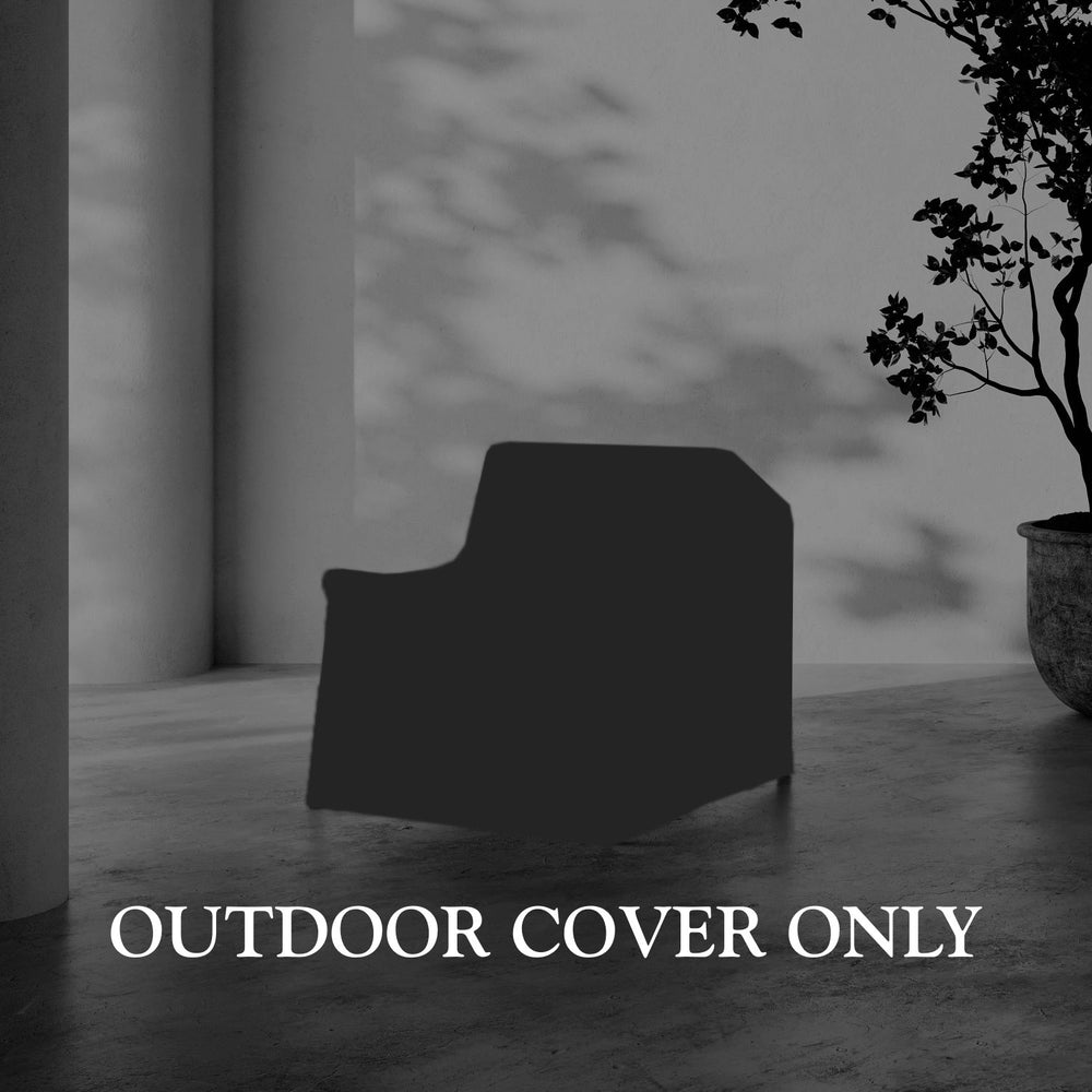 Lemieux et Cie Hudson Lounge Chair Outdoor Cover in dark tone, fitted cover shown on stone flooring near white column and tree shadows.