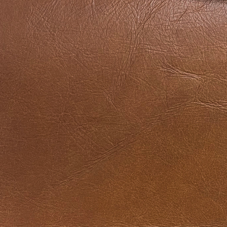 Lemieux et Cie Genuine Italian Leather Swatch in warm spice brown, material sample showing natural grain texture and subtle surface variation.