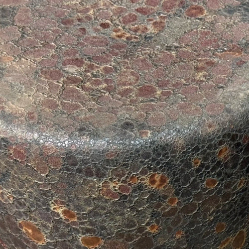 Close-up of a textured glaze surface on the Taiko Stool / End Table by Lemieux et Cie in Oxide Bloom reactive glaze with rust, charcoal, and mineral tones. 