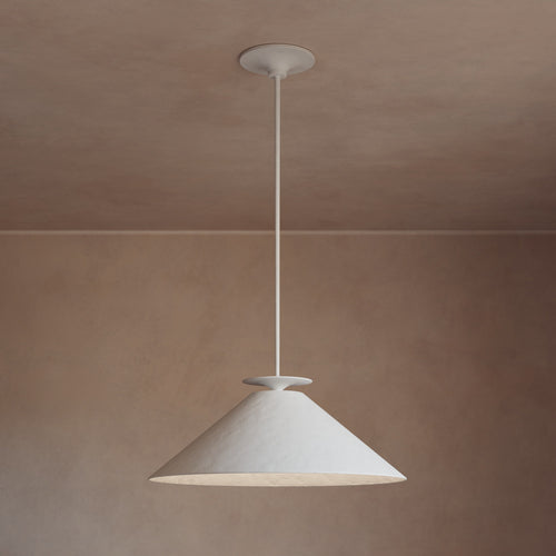 Lemieux et Cie Pontoise Pendant Light in white, conical pendant fixture with slim rod, hung against warm neutral plaster walls in soft daylight.