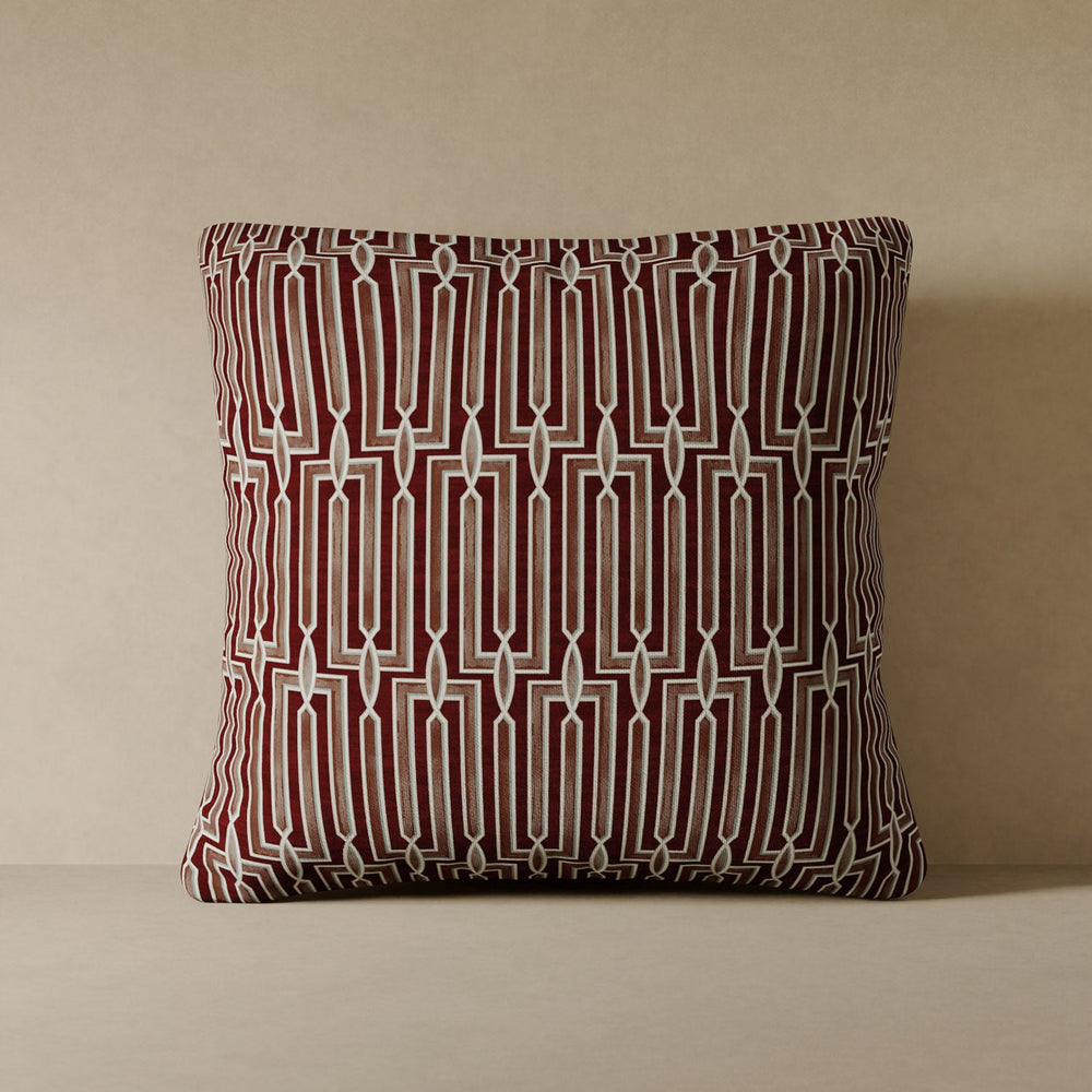Lemieux et Cie Arbus Stripe Velvet Pillow in burgundy, geometric statement pillow with interlocking linear pattern, shown on neutral backdrop.