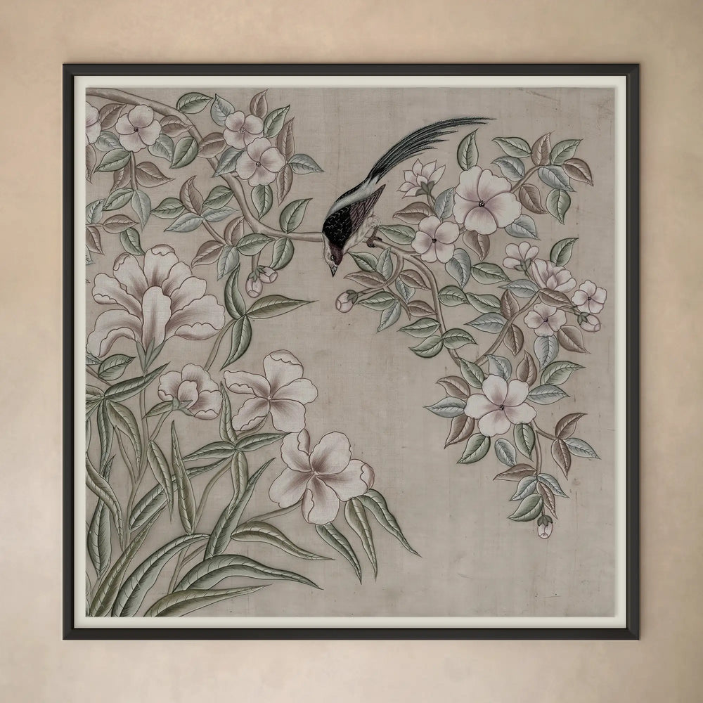 Lemieux et Cie Rêve De Mahal framed artwork in gouache and ink, botanical motif with bird and blossoms, displayed on warm plaster wall.