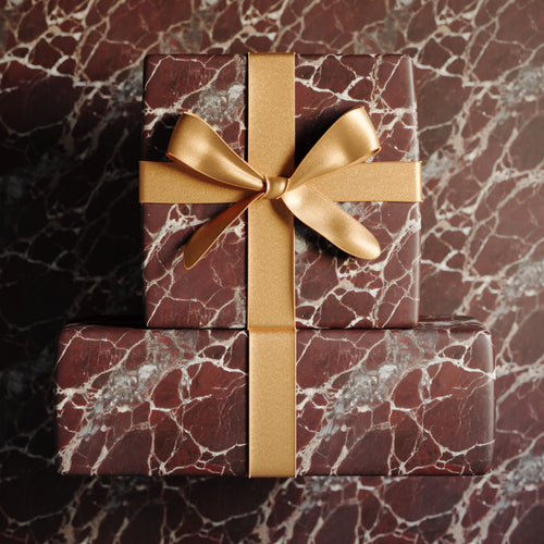 Lemieux et Cie Rosso Levanto fancy wrapping paper featuring wine-red Renaissance marble veining.