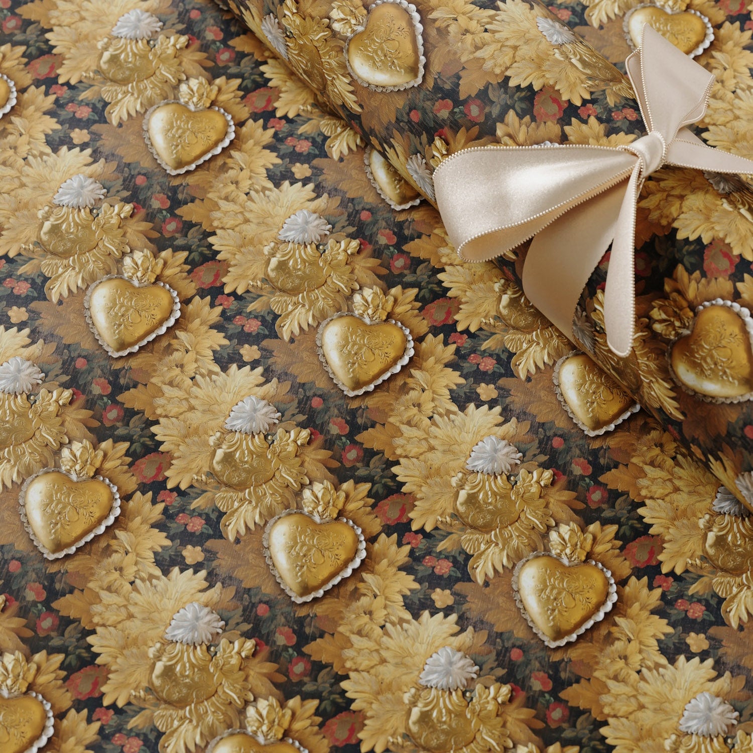 Lemieux et Cie Victorian Locket fancy gift wrapping that draws from 19th-century sentimental jewelry, when heart-shaped lockets held portraits and keepsakes.