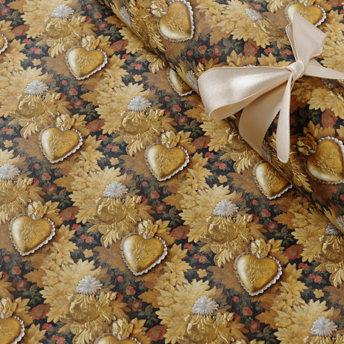 Lemieux et Cie Victorian Locket fancy gift wrapping that draws from 19th-century sentimental jewelry, when heart-shaped lockets held portraits and keepsakes.