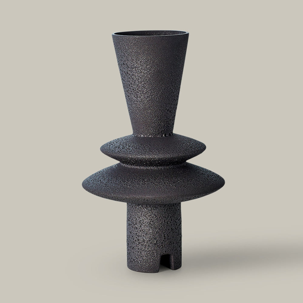 Lemieux et Cie Adelyn Geometric Vase in black, sculptural stacked-form ceramic vessel with textured surface, shown on neutral studio backdrop.