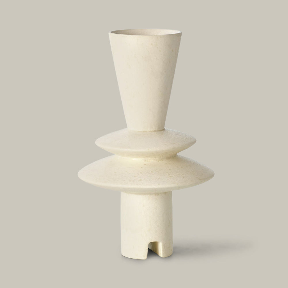 Lemieux et Cie Adelyn Geometric Vase in white, sculptural ceramic vessel with stacked geometric forms and arched base, shown on neutral backdrop.