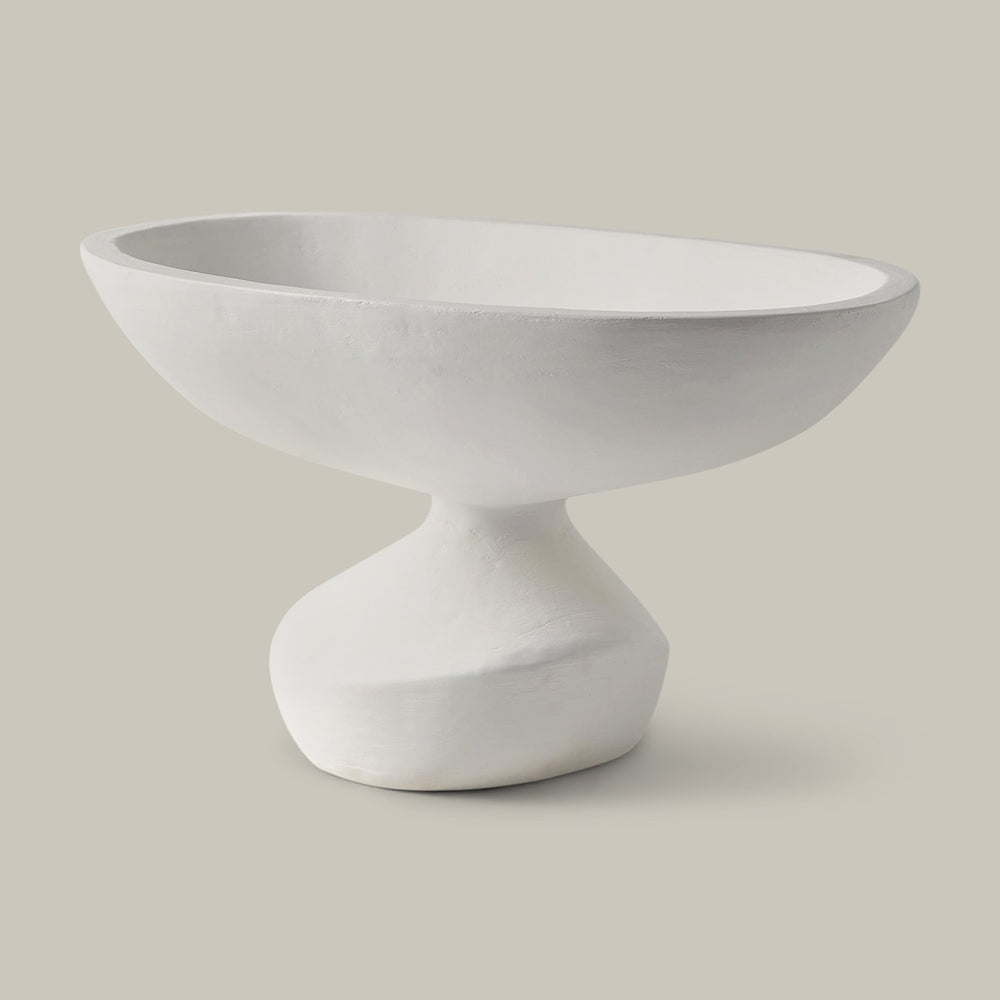 Lemieux et Cie Ducoli Organic Bowl in white, sculptural pedestal bowl with shallow rounded form and tapered base, shown on neutral studio backdrop.