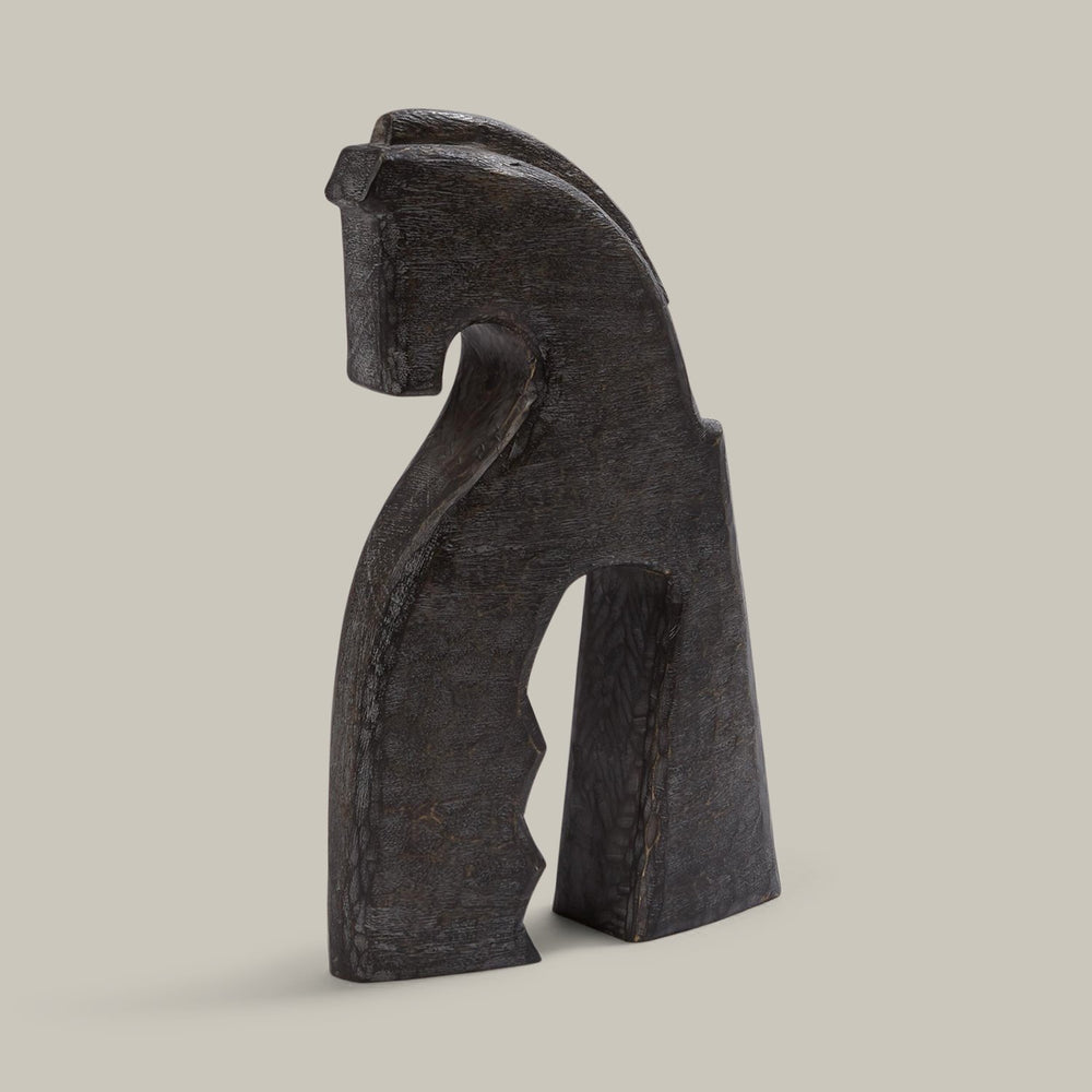 Lemieux et Cie Cheval Object, sculptural horse form in dark charcoal finish, decorative object shown on neutral studio backdrop.