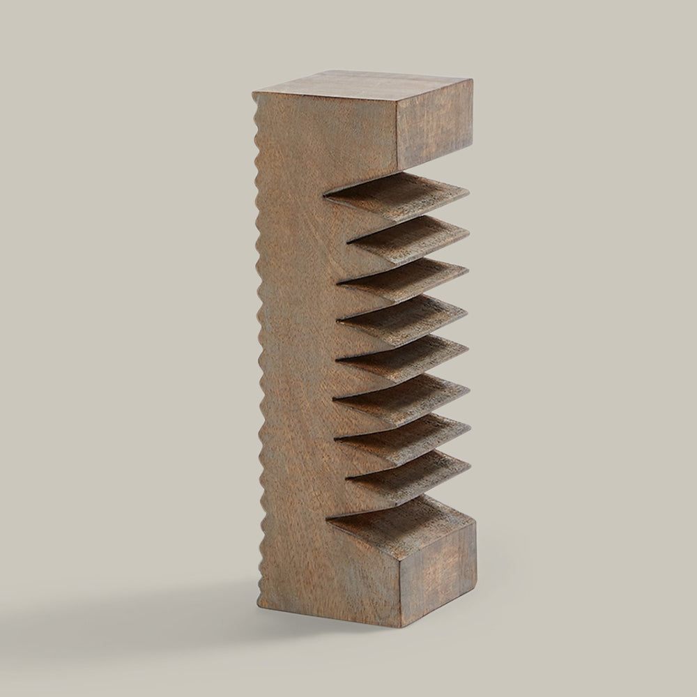 Lemieux et Cie Moret Pillar, sculptural wooden pillar with layered geometric pleats, decorative accent shown on neutral studio backdrop.