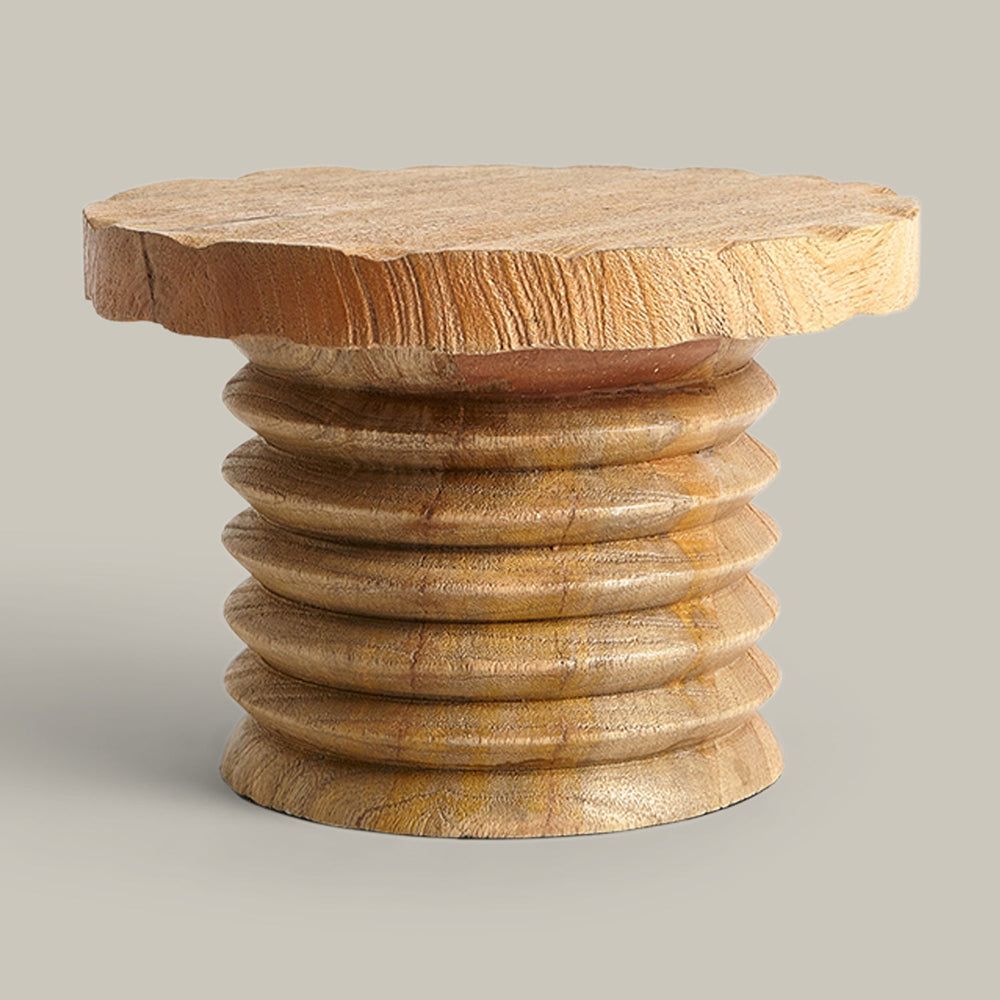 Lemieux et Cie Seraphin Pedestal, sculptural stacked disc form with organic live-edge top, shown on neutral studio backdrop.